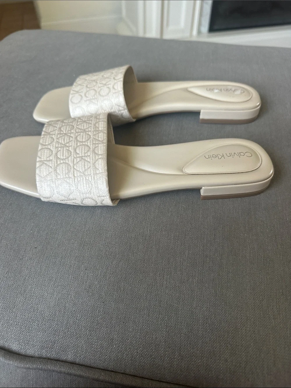Calvin Klein Pearl White Embossed Logo Slide Sandals